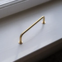 Bøjlegreb • Messing • 128 mm • Rund Fodskive